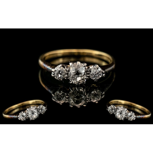 128 - 18ct Gold & Platinum Attractive 3-Stone Diamond Ring, marked 18ct and Platinum to shank.  The diamon... 