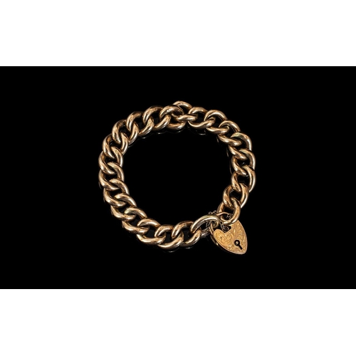 144 - Antique Period 9ct Gold Curb Bracelet with Heart Shaped Padlock. All Links Marked 9ct. Good Conditio... 