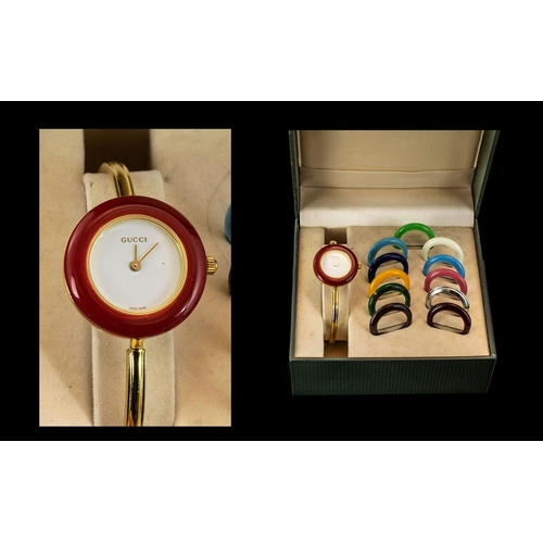 159 - Gucci - Vintage Gold Tone Ladies Interchangeable Bezel Watch. The Gold Tone Watch Comes with Its Ori... 