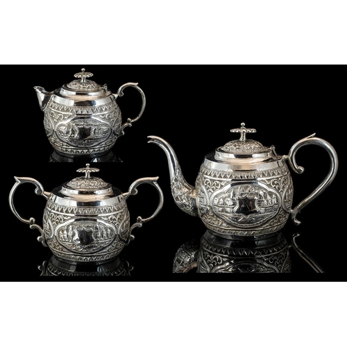 184A - Victorian Period Excellent Quality Colonial Three Piece Silver Tea Service, decorated with embossed ... 