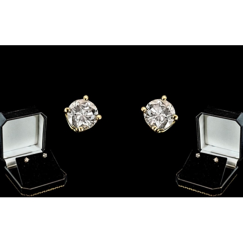 18A - A Fine Pair of 18ct Gold Single Stone Diamond Set Earrings. Marked 750 - 18ct ( Studs ) The Round Br... 