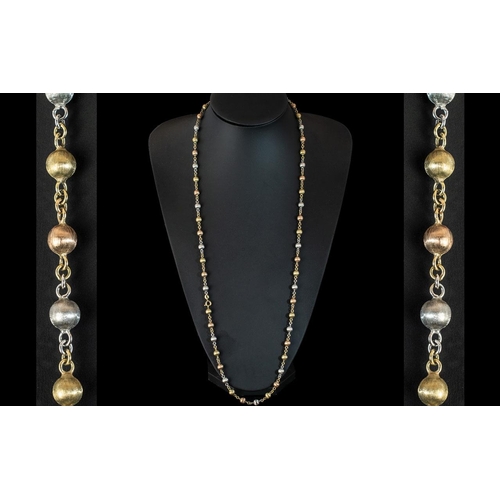 19 - A Superior Quality 9ct Two Tone Gold Fancy Long Chain with Baubles Design, White and Yellow Gold. Ma... 