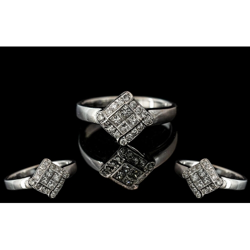 21A - 18ct White Gold - Attractive and Well Designed Diamond Set Dress Ring. Marked 750 - 18ct to Shank. T... 