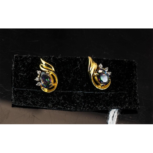 237 - Mystic Topaz and Diamond Stud Earrings, each oval cut topaz displaying flashes of royal purple and e... 