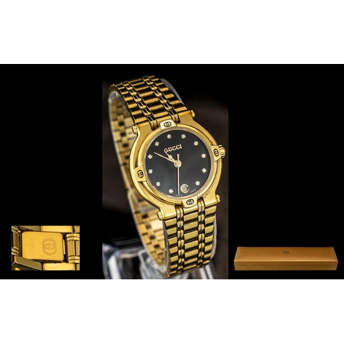 245 - Gucci Ladies 18ct Gold Plated Wrist Watch ( Extra Links ) With Black Dial, Set with Diamond Markers.... 