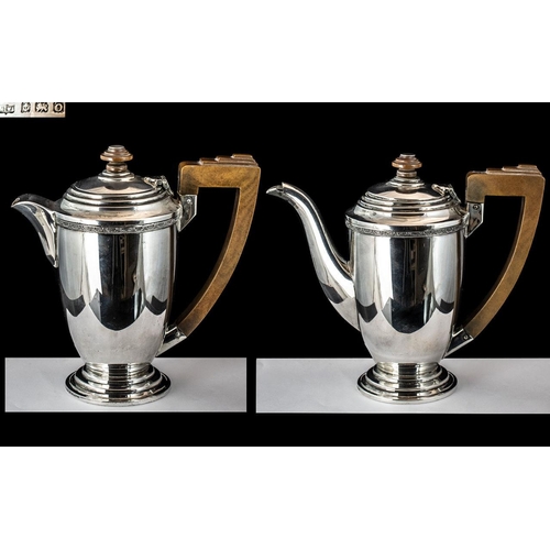 297 - Mappin & Webb Fine Pair of Sterling Silver Water & Coffee Jugs (2), of pleasing design and proportio... 