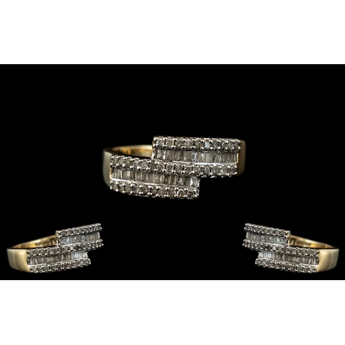 306 - Ladies Nice Quality 9ct Gold - Diamond Set Designer Ring. The Baguette and Brilliant Cut Diamonds of... 