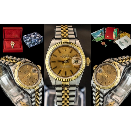 31 - Rolex - Ladies 18ct Gold and Steel Oyster Perpetual Date-Just Chronometer Wrist Watch with a Champag... 