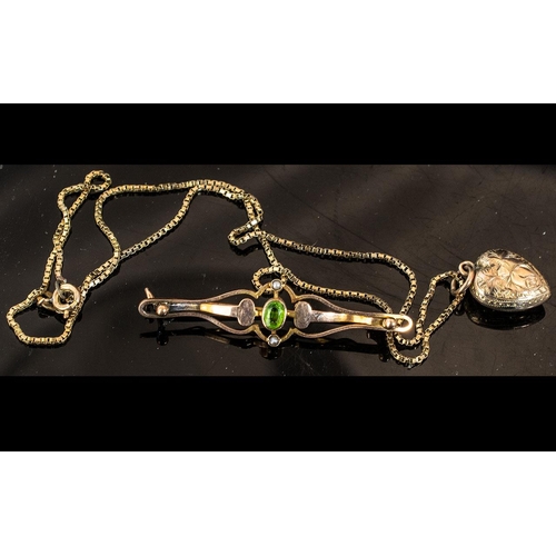 312 - 9ct Gold Heart on Chain, together with a 9ct gold bar brooch set with a green stone and seed pearls.