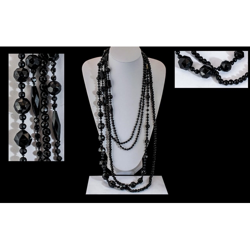 319 - Victorian Period - A Trio of Fine Fancy Design Black Jet Long Necklaces. Longest Necklace 54 Inches ... 