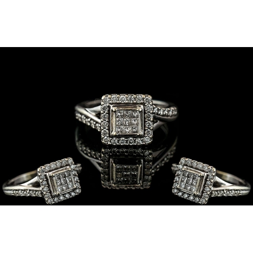 33 - Ladies - Attractive 9ct White Gold Diamond Set Ring. Pleasing Design of Square Form, The Brilliant a... 