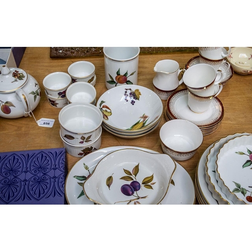 656 - Royal Worcester 'Evesham' set comprising teapot, 4 x 10'' plates, 12'' oval platter, two flan dishes... 