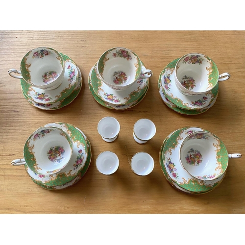 705 - A Paragon Rockingham Design Part Teaset comprising 4 egg cups, 5 tea cups, 5 saucers, and 6 cake pla... 