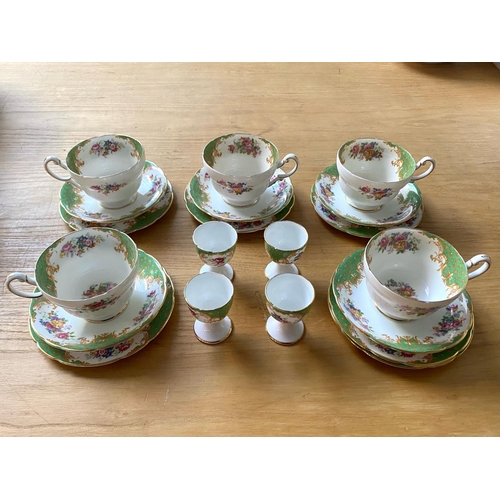 705 - A Paragon Rockingham Design Part Teaset comprising 4 egg cups, 5 tea cups, 5 saucers, and 6 cake pla... 