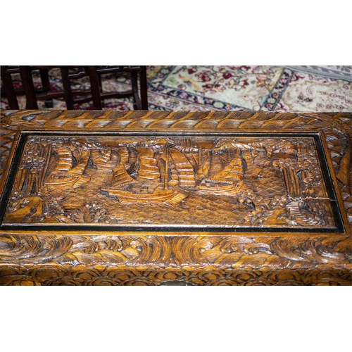 79B - A Heavily Carved Camphor Wooden Blanket Chest. Depicting a Docking Scene, surrounded  by Koi Fish an... 