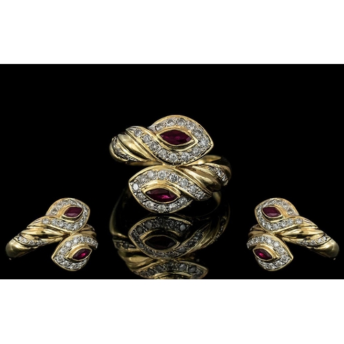 9 - A Superb 18ct Gold Double Headed Snake Ring, Set with Diamond to Head with Ruby Set Eyes. Marked 750... 