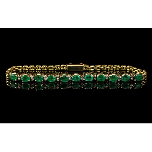 9A - Ladies 18ct Gold Attractive Diamonds & Emeralds Set Bracelet, stamped 18ct - 750.  The 11 faceted em... 