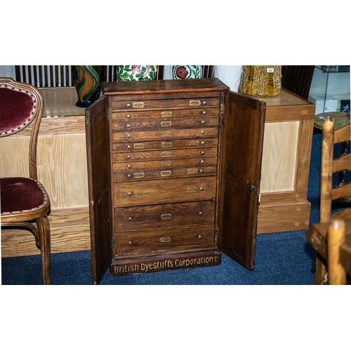 1011 - 1930's Oak Wooden Specimen Cabinet, with two cupboard doors opening to reveal eight small drawers ov... 