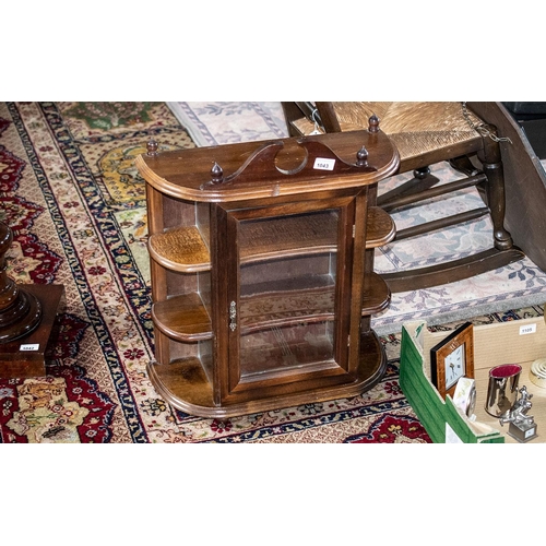 1043 - Glass Fronted Wooden Display Cabinet, with three shelves and decorative finial.  Measures 24'' tall ... 