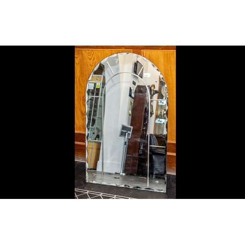 1045 - Arched Bevelled Glass Wall Mirror, Measures 35'' x 23''.