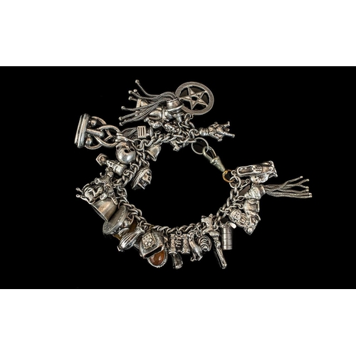 114A - A Good Quality Vintage, Heavy Sterling Silver Charm Bracelet - Loaded With Over 25 Silver Charms, Al... 