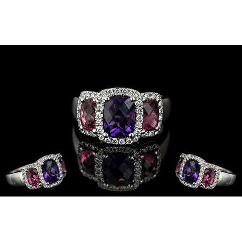 22 - 18ct White Gold Superb Contemporary Ladies 3 Stone Pink Tourmaline and Amethyst Set Ring, the stones... 