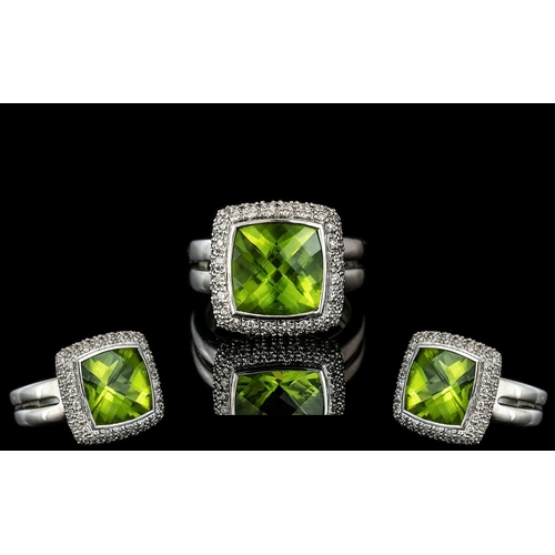 23 - 18ct White Gold Superb Contemporary Peridot & Diamond Set Dress Ring.  Fully hallmarked for 18ct - 7... 