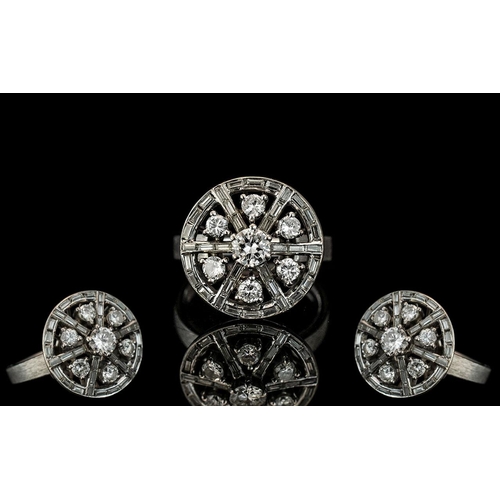 35A - A Fine Quality & Attractive White Gold Diamond Set Ring, of wheel design.  The outer section of this... 