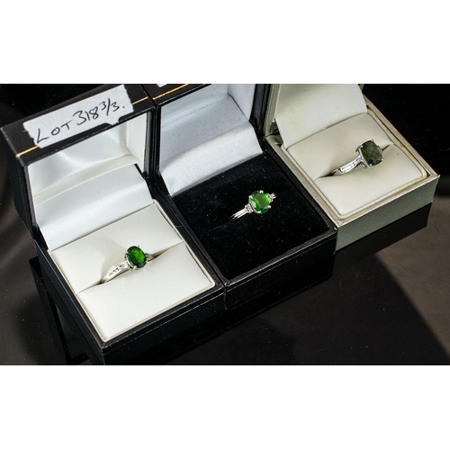 378A - Three 9ct White Gold Dress Rings, set with green Tourmaline and diamond shoulders. All fully hallmar... 