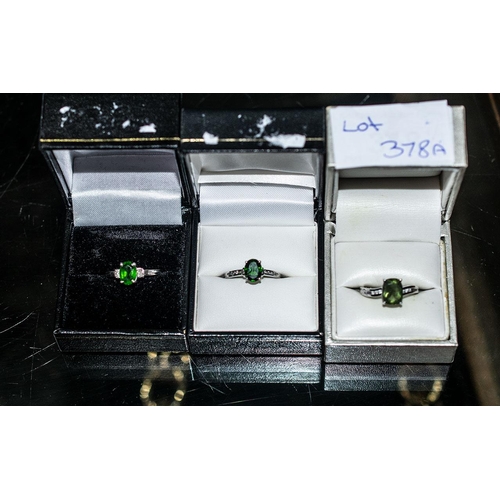 378A - Three 9ct White Gold Dress Rings, set with green Tourmaline and diamond shoulders. All fully hallmar... 