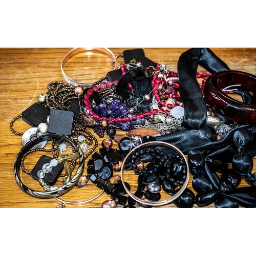 399A - Large Bag of Costume Jewellery, including unusual vintage necklaces, wooden, glass, silver, copper, ... 