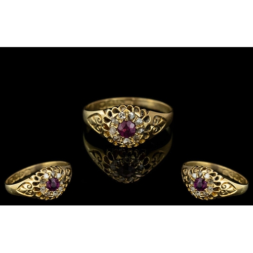 423 - 18ct Gold Antique Ruby & Diamond Ring, central Ruby surrounded by nine rosecut diamonds.  Fully hall... 