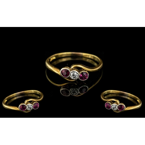 425 - 18ct Gold Antique Ruby & Diamond Ring, central diamond surround by two rubies on a twist.  Hallmarke... 