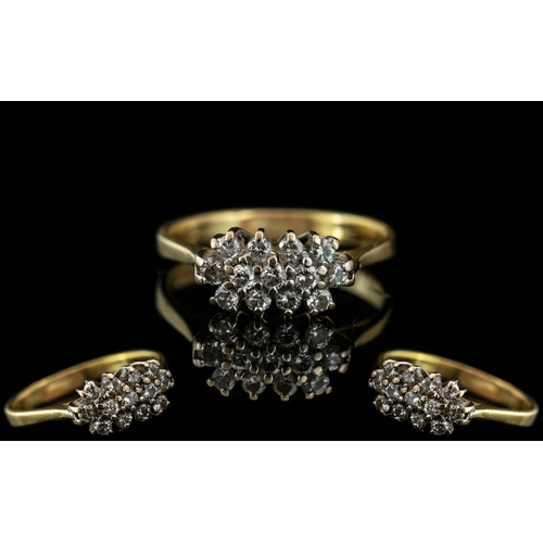 427 - 18ct Gold Diamond Cluster Ring, set with round modern brilliant cut diamonds, stamped 750.  Ring siz... 