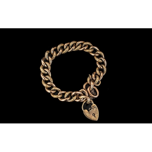 43 - Antique Period 9ct Gold Snake Skin Design Curb Bracelet, with safety chain and heart shaped padlock,... 