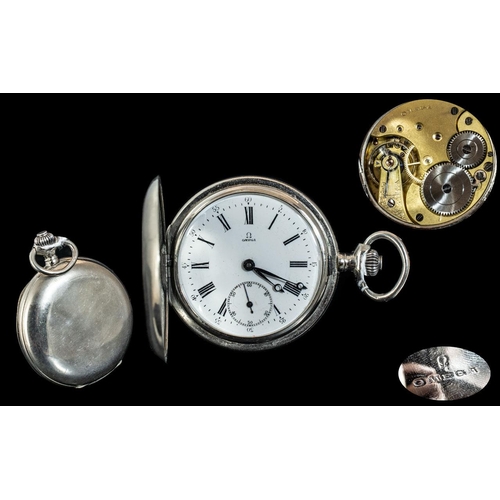 475 - An Omega Full Hunter Pocket Watch, white enamel dial, Roman numerals, with subsidiary seconds.  52 m... 