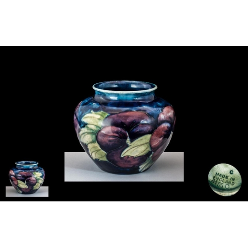 516 - W. Moorcroft Small Pansies Vase on Blue Ground of Globular Form. Height 2,5 Inches - 6,25 cms. Condi... 