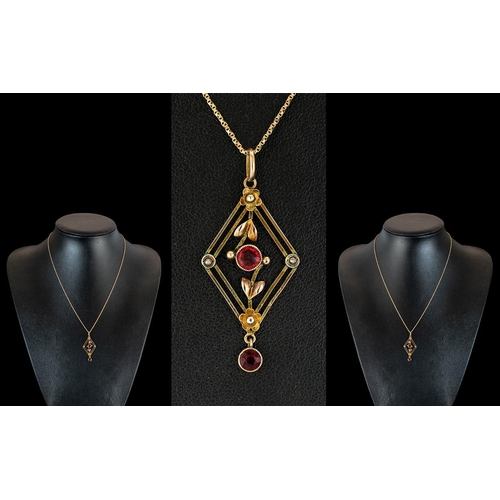 62 - Victorian Period Attractive 9ct Gold Exquisite Open Worked Pendant, set with rubies and seed pearls.... 