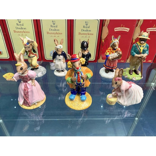 623 - Collection Of 8 Royal Doulton Bunnykins - To Include 'Clarence The Clown,' 'Summer Lapland,' 'Scout ... 