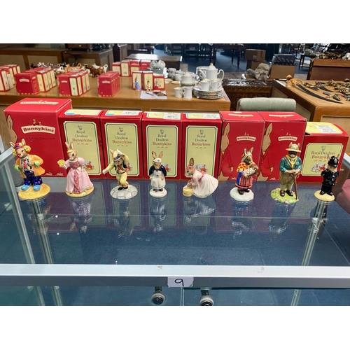 623 - Collection Of 8 Royal Doulton Bunnykins - To Include 'Clarence The Clown,' 'Summer Lapland,' 'Scout ... 