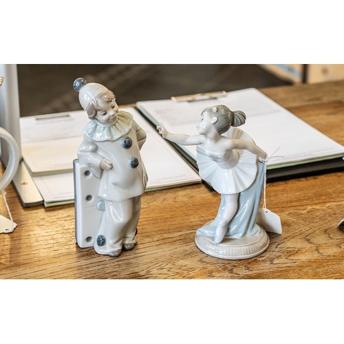 646 - Lladro Domino Clown Figure, measures 8'' tall, together with a Nao ballerina figure 7'' tall, and a ... 