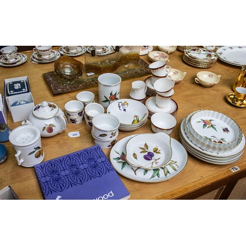 655 - Royal Worcester 'Evesham' set comprising teapot, 4 x 10'' plates, 12'' oval platter, two flan dishes... 