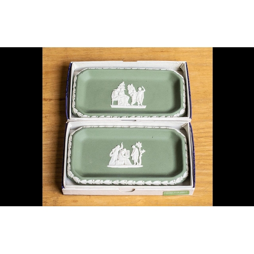 660 - Wedgwood Two Green Jasper Oblong Dishes, in original boxes, together with two unboxed Blue Jasper.