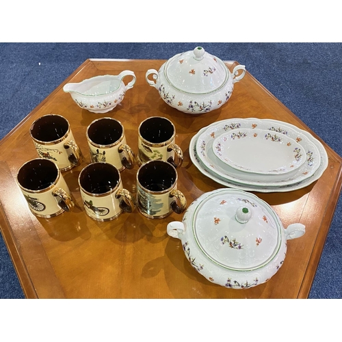 680 - A Small Collection Of Porcelain comprising, six drinking tankards, three serving platters, one gravy... 