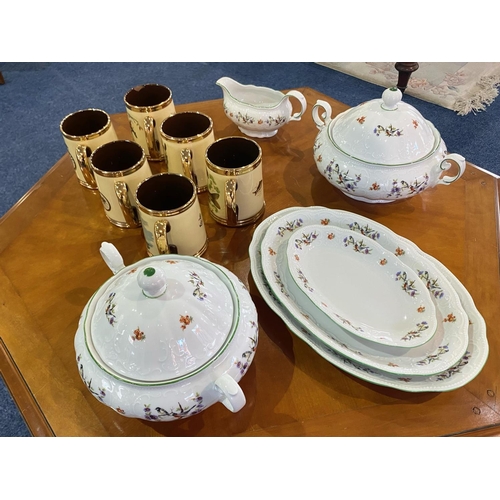 680 - A Small Collection Of Porcelain comprising, six drinking tankards, three serving platters, one gravy... 