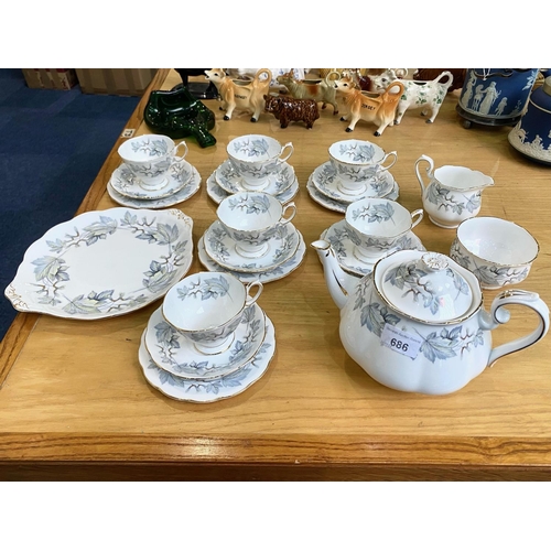 686 - Royal Albert Silver Maple Part Dinner Set to include a teapot, sandwich/cake plate, six side plates,... 