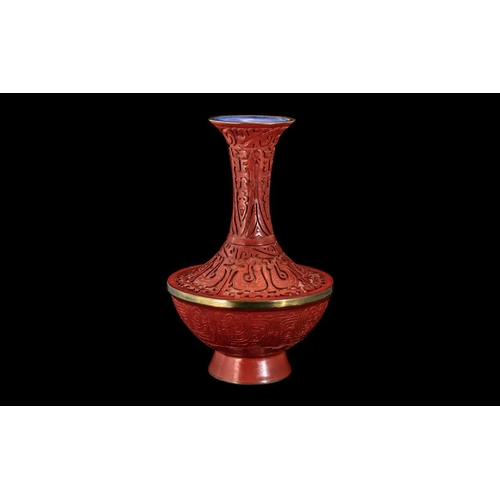 855 - Chinese Red Cinnabar Vase, unusual shape, enamelled blue interior, superb condition.  Looks to have ... 