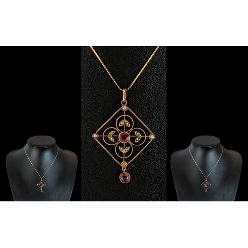 93 - Antique Period - Attractive 9ct Gold Open Worked Pendant Set with Rubies and Seed Pearls. Marked 9ct... 