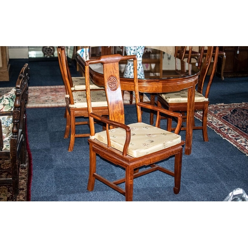 1017 - A Late 20th Century Mahogany Chinese Style Extending Table And Chairs Table Of Circular Form, Six Di... 