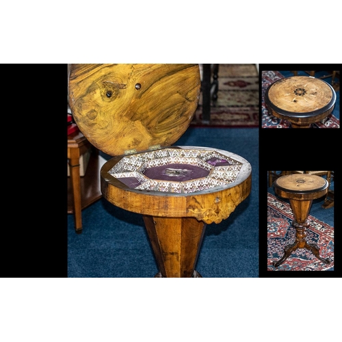 1024 - A Victorian Walnut Sewing Table The Hinged Circular Top With Inlay, On A Sectional And Carved Suppor... 